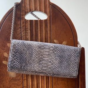 EUC small leather clutch snake pattern